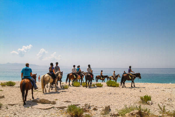 Group of riders arriving to the Ionian Sea